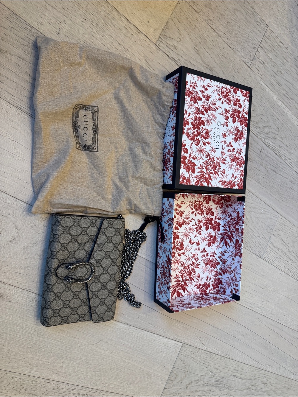 Gucci GG Supreme Dionysus wallet on chain